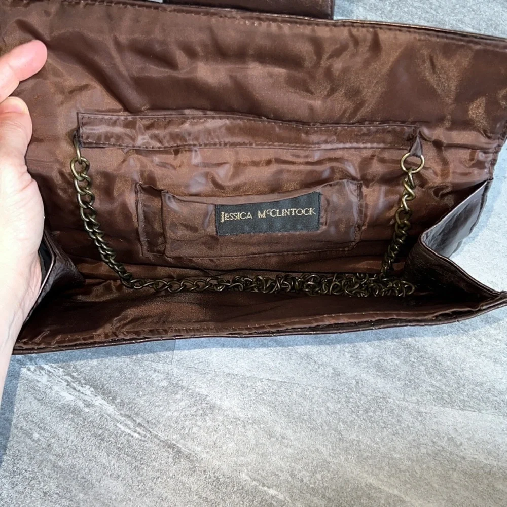 Brown shiny textured clutch bag with chair for shoulder bag‎